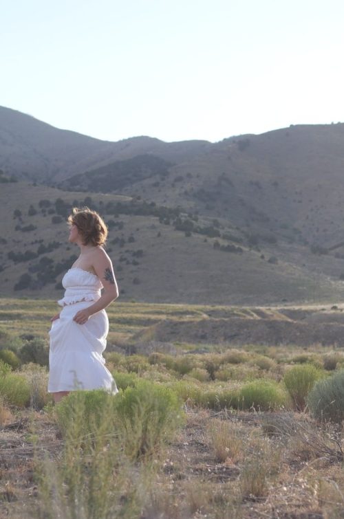 girl running through field